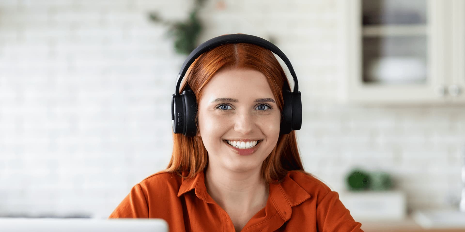 Distance learning student studying a degree from a laptop at home