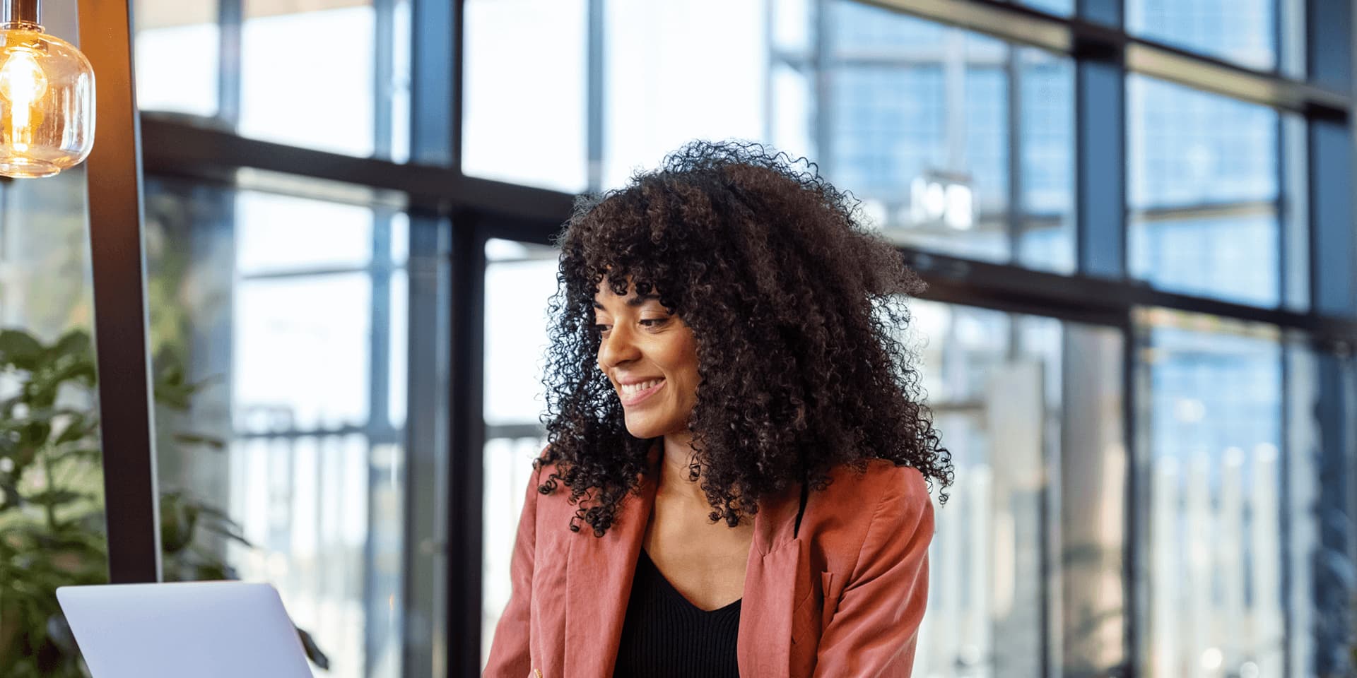 A data scientist using data analytics to solve statistical problems for business managers with a large data set.