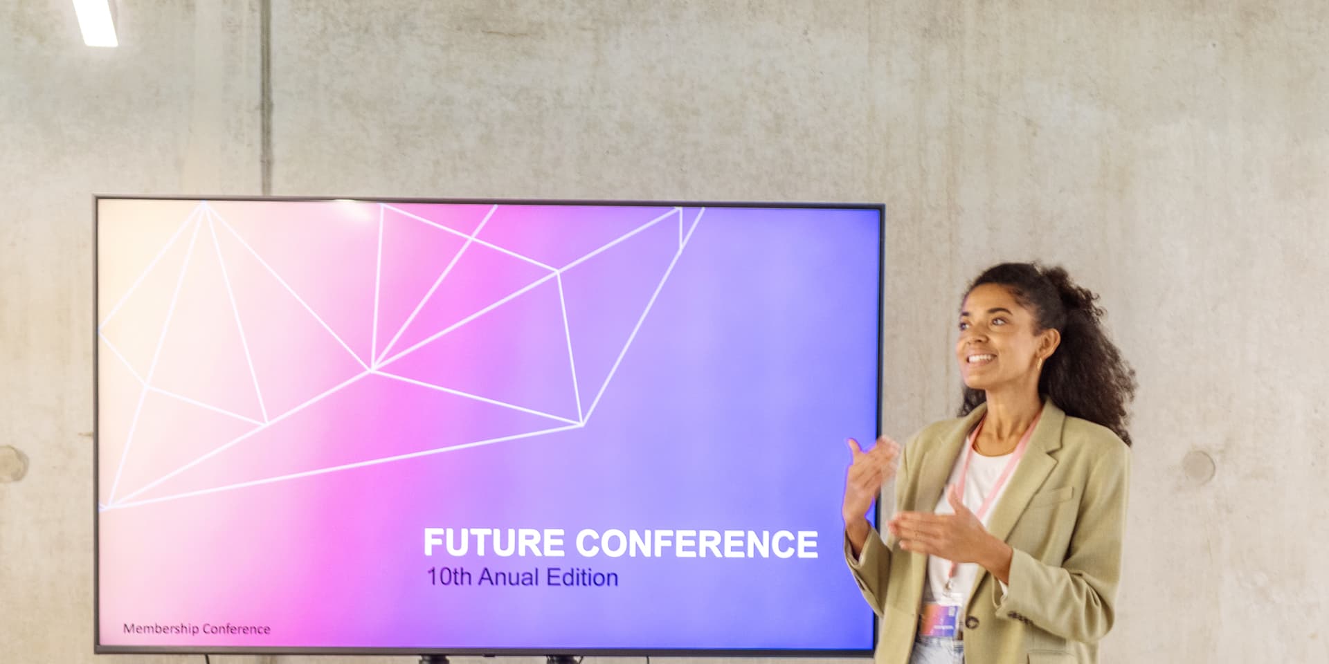 A confident business leader speaking at a deep learning conference about AI.