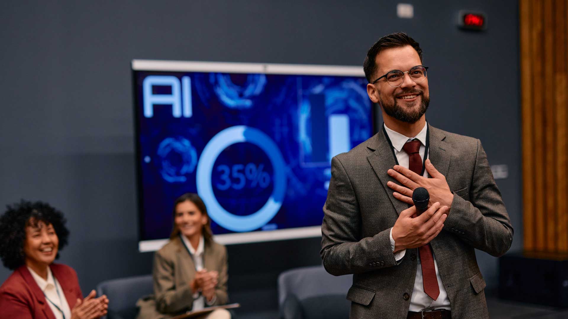 Smartly dressed strategy lead pitching ideas for AI solutions and responsible AI adoption.