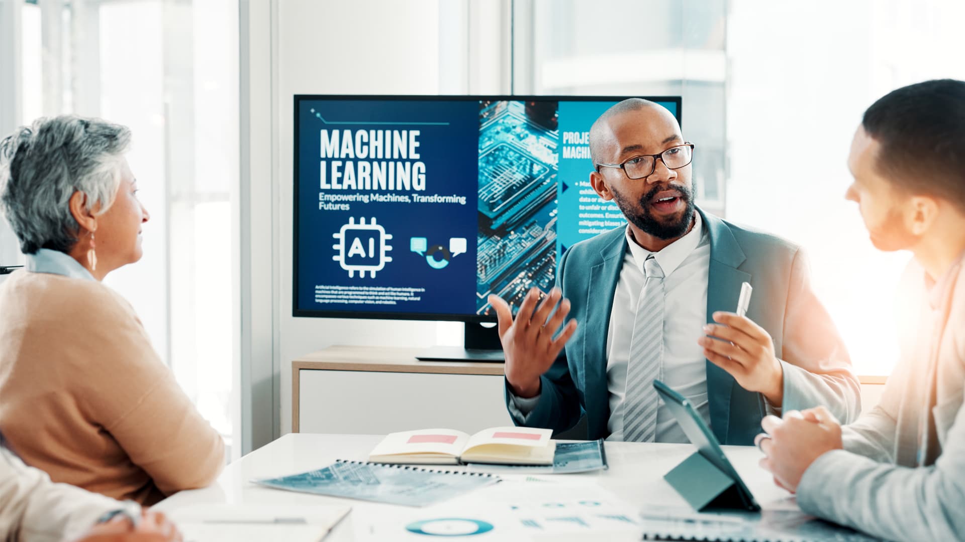 A confident machine learning engineer in a meeting about deep learning techniques.